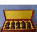 A set of five Chinese carved hardwood Buddhas,