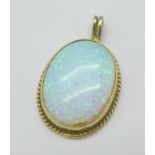 A 9ct gold and synthetic opal pendant, 4.