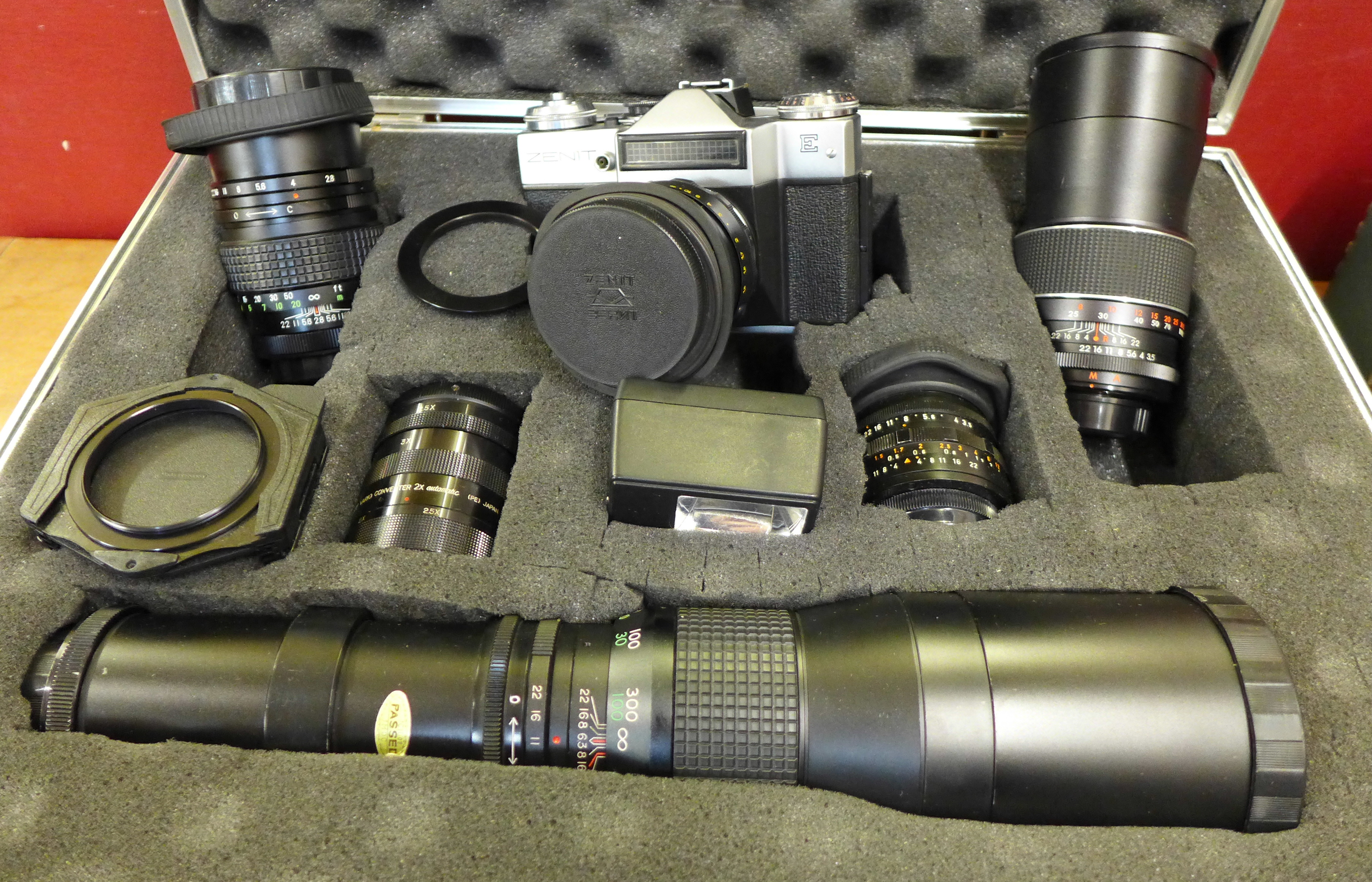 A Zenit E 35mm film camera, six lenses including 1:6.