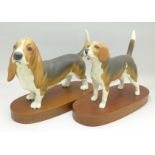 Two Beswick model dogs on stands,