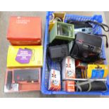 Photographic equipment including a boxed Kodak Instamatic camera, viewers and flashes, etc.