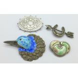 A silver and enamel brooch by Charles Horner, enamel a/f and lacking pin,