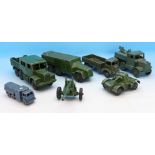 Seven military Dinky Toys model vehicles