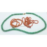 Two coral necklets and a jade necklet