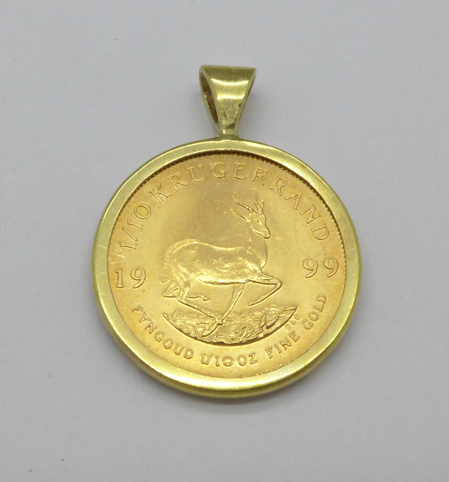 A 9ct gold mounted 1/10th Krugerrand, 1999,