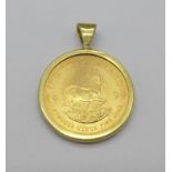 A 9ct gold mounted 1/10th Krugerrand, 1999,