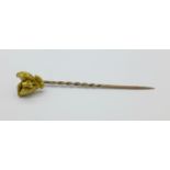 A gold ingot tie pin, 4.
