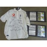 A signed England cricket shirt, circa year 2000 and two albums of cricket stamps,