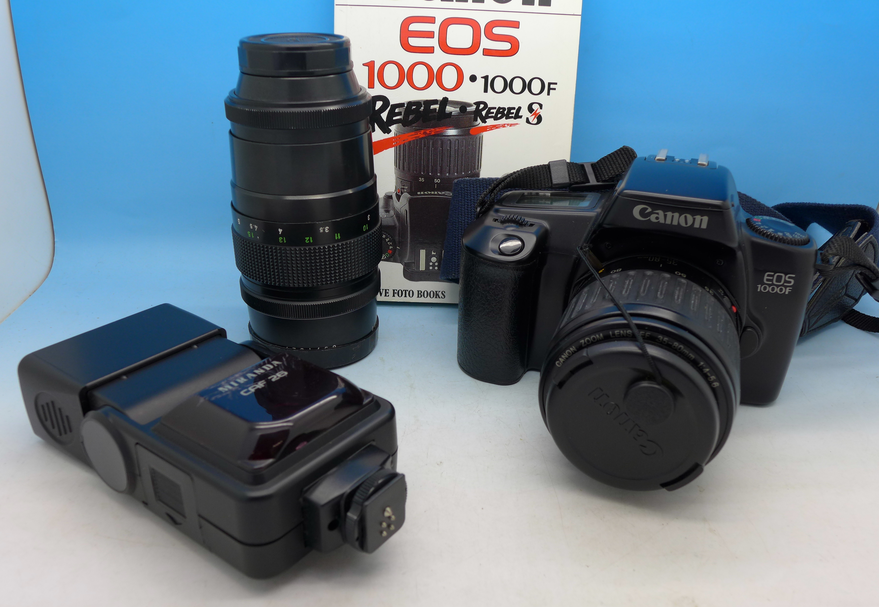 A Canon EOS1000 35mm camera,