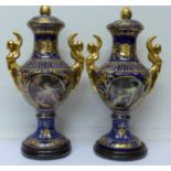 A pair of Austrian style vases with covers and stands,