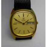 An Omega quartz wristwatch with day and date,