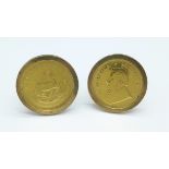 A pair of 9ct gold mounted 1/10th Krugerrand cufflinks, 1981, total weight 15.