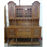 A carved oak dresser