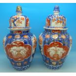 Two Imari lidded vases,