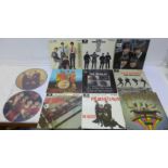 Eleven The Beatles 7" vinyl singles including two picture discs