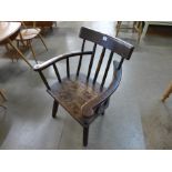 A late 18th Century primitive elm stick back chair