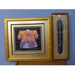 A Chinese framed ceremonial fluter and a Chinese framed dragon robe