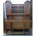 A carved oak dresser