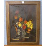 A still life, flowers and Chinese figure, oil on panel,