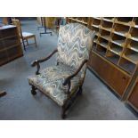 A French 19th Century fruitwood and upholstered armchair