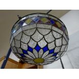 A stained glass hanging ceiling light