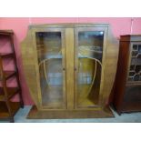 An Art Deco walnut display cabinet