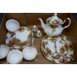 A Royal Albert Old Country Roses six-setting tea set with large teapot and three-tier cake stand,