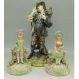 A Capodimonte figure and a pair of continental figures,