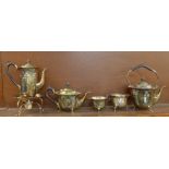A five piece Art Nouveau hammered silver plate tea service by Mappin & Webb