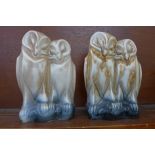 A pair of Langley pottery owls, height 24cm,