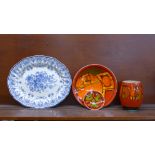 Three pieces of Poole pottery and a blue and white meat platter, height of vase 15.