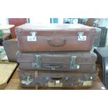 Three leather suitcases