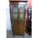 An Edward VII inlaid mahogany display cabinet on stand