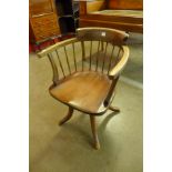 A Victorian beech captain's chair
