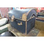 A leather mounted dome topped steamer trunk