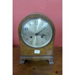 An early 20th Century mahogany and burr walnut bracket clock