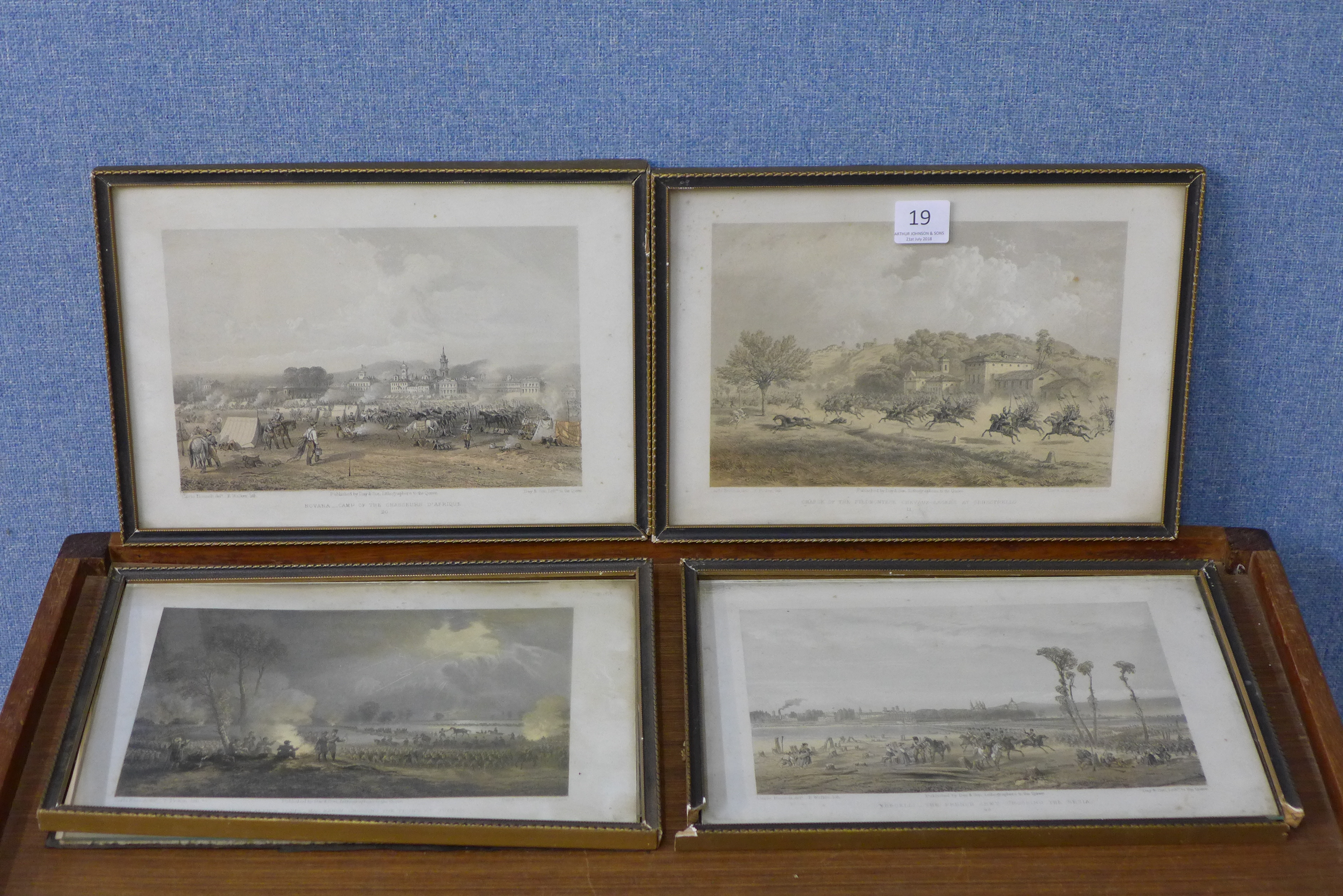 A set of four French military scene engravings, published by Day & Son, Lithographers to The Queen,