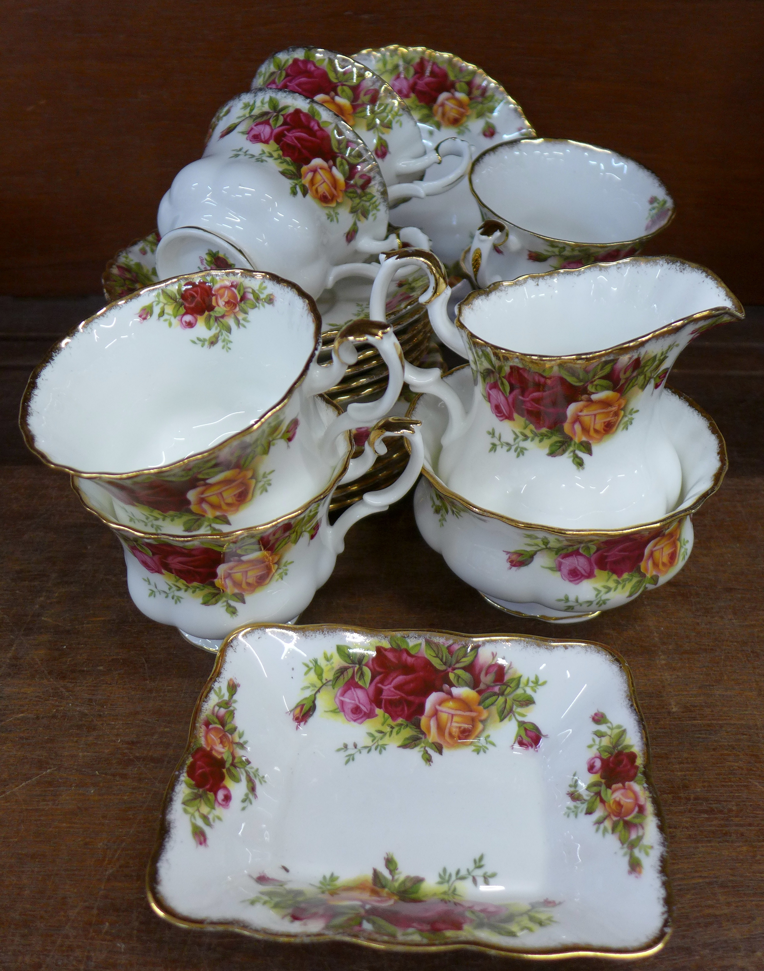 A Royal Albert Old Country Roses tea set, six cups, saucers and side plates, cream,