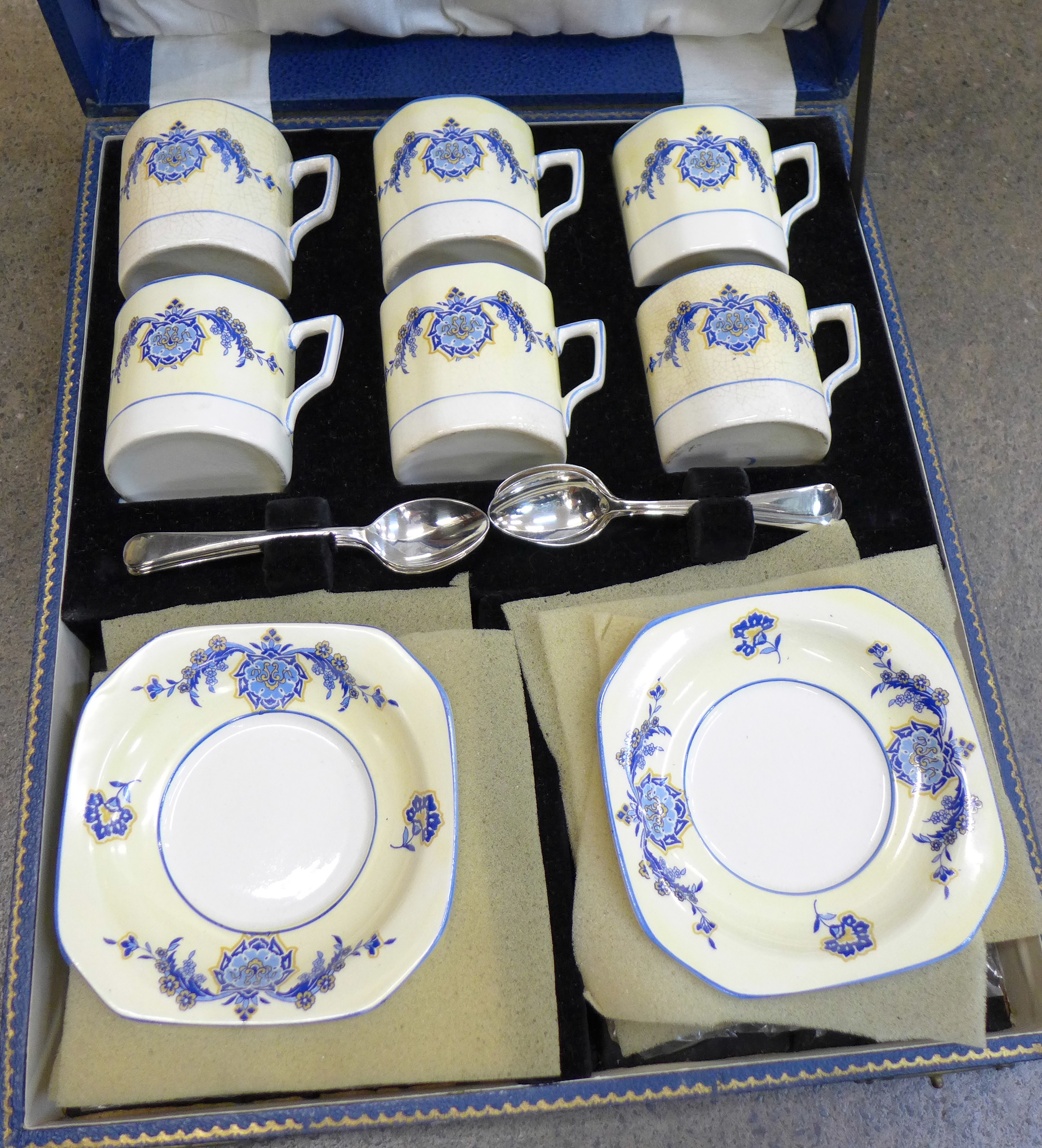 A Meir Ware coffee service, six cups, saucers and spoons,