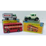 Three boxed Matchbox vehicles; 73 Model 'A' Ford,