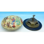 A mounted incense burner lid and a circular lidded pot