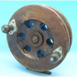 A wooden sea fishing reel,