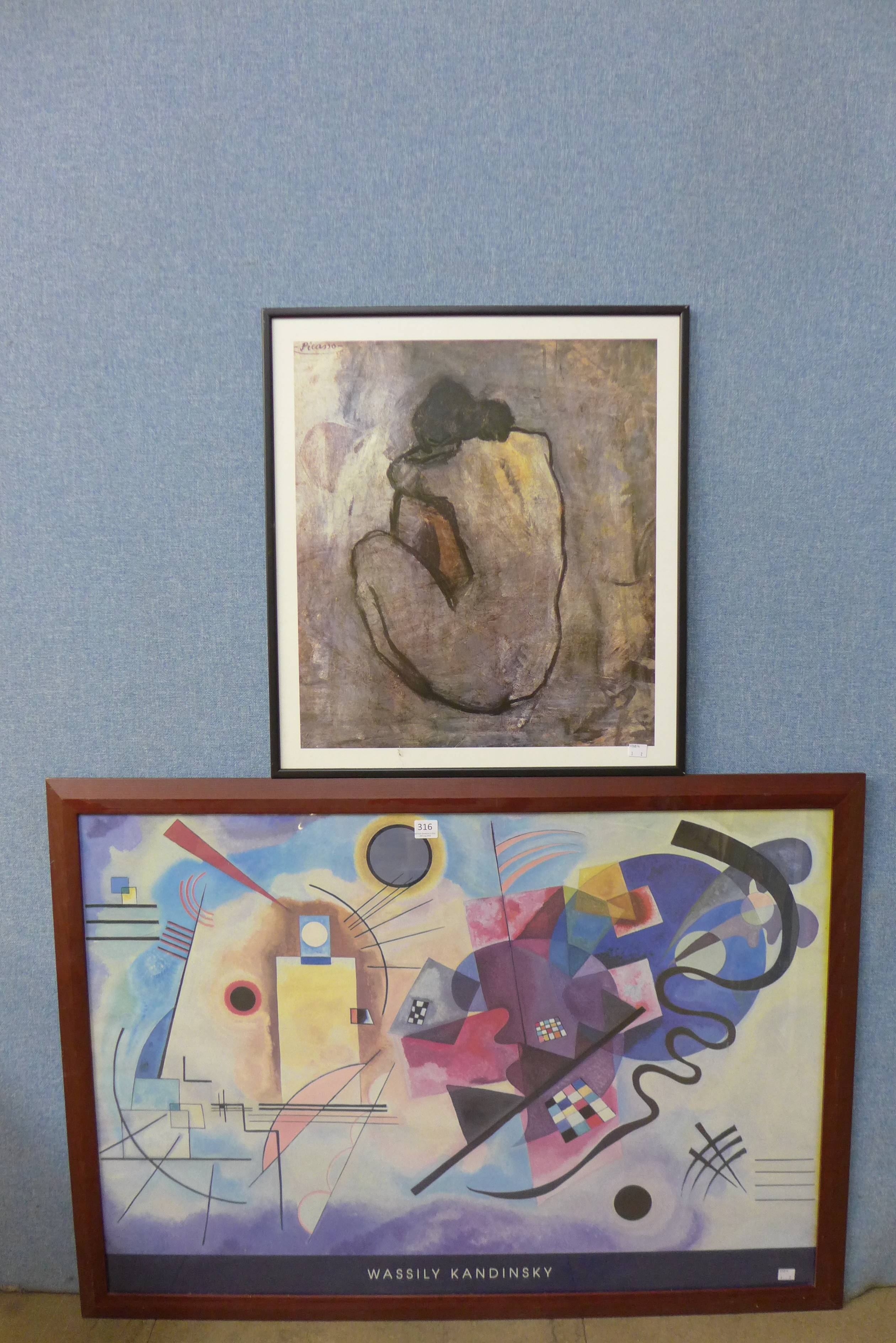 A Wassily Kandinsky print and a Picasso print