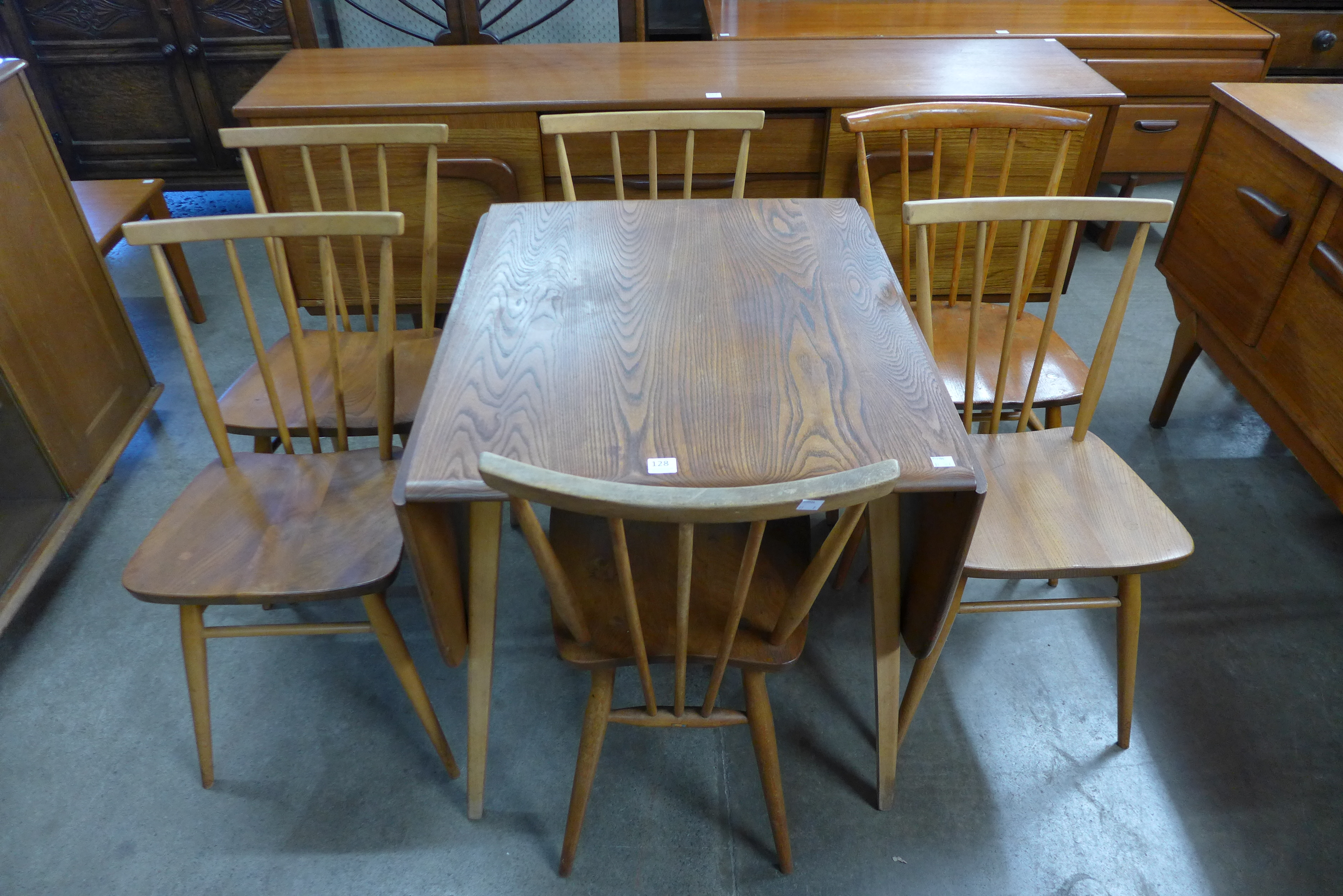 An Ercol drop-leaf table and six chairs