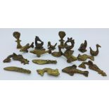 A collection of eighteen African Asanti brass dealers weights