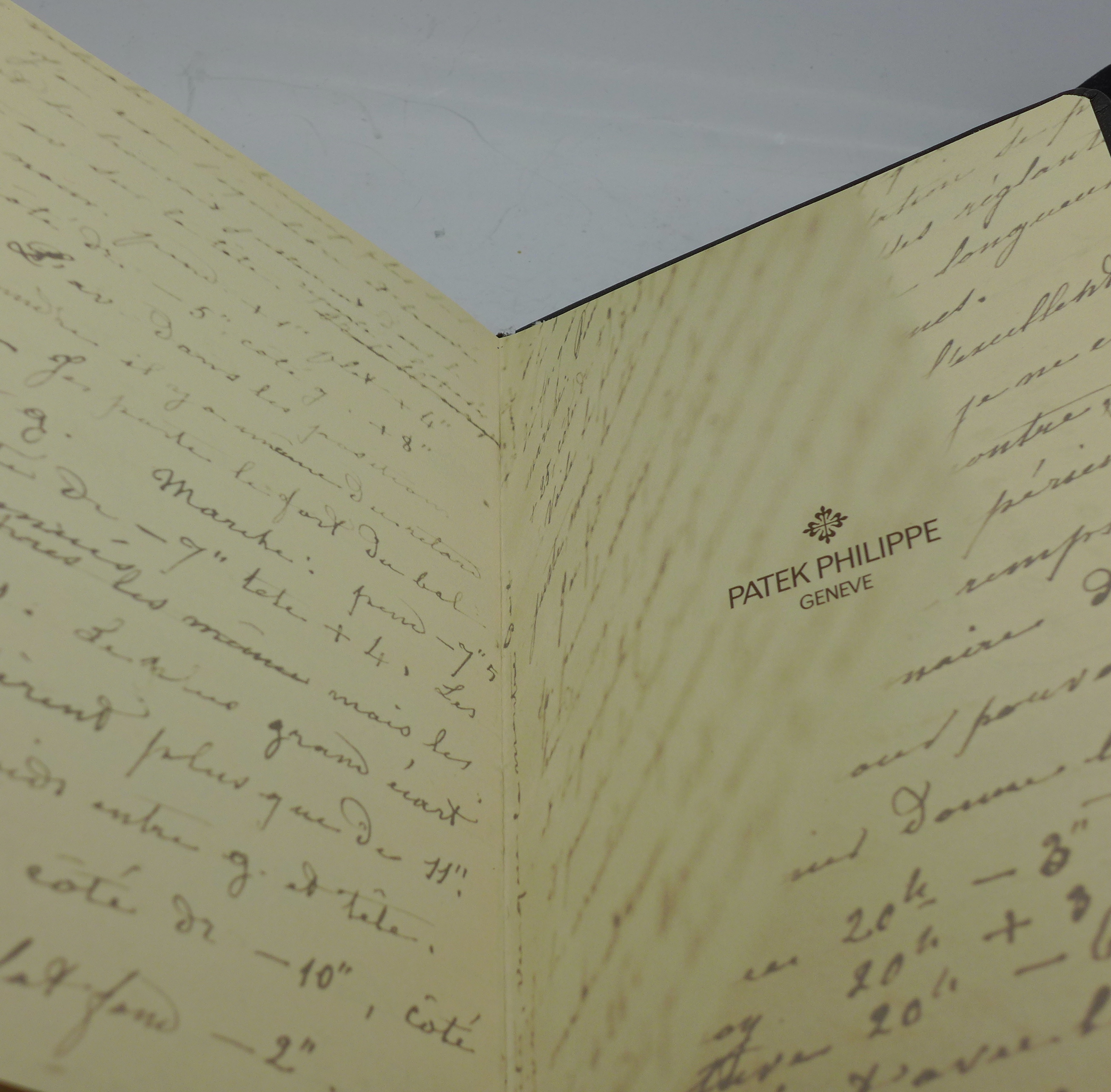 A Patek Philippe notebook and two cases marked Officine Panerai - Image 4 of 4