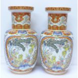 A pair of Italian made vases, 30.