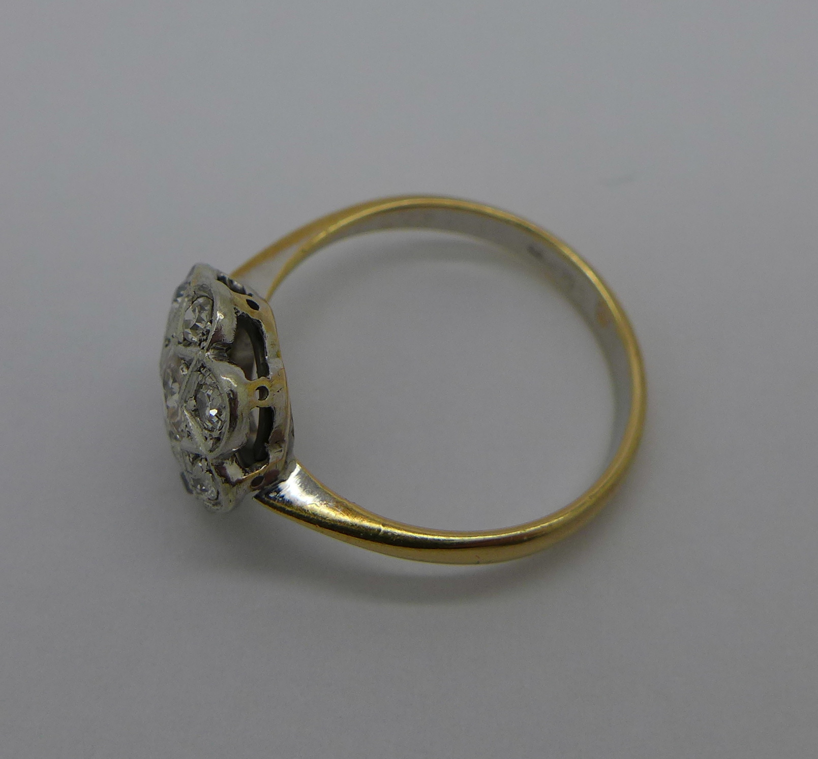 An 18ct gold Art Deco cluster ring set with old mine cut diamond centre stone, c. - Image 2 of 2