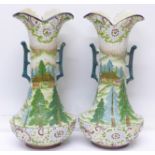 A pair of early 20th Century oriental style vases with hand painted Japanese garden decoration,