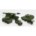 Four Dinky military vehicles and one Corgi military vehicle